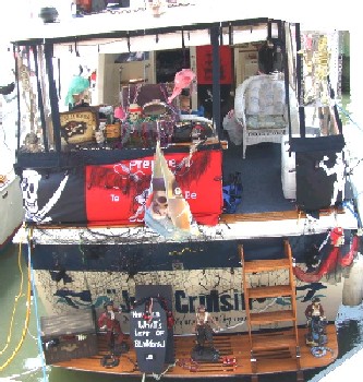 A decorated party boat at the dock