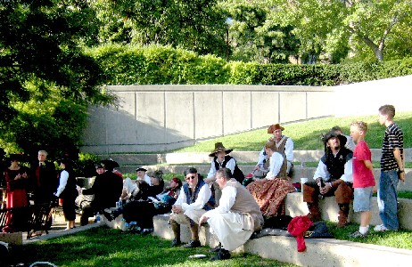 The pirates hanging out in the park across from the Santa Maria