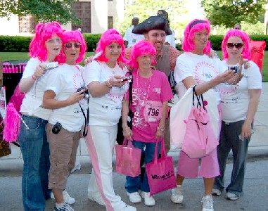 Pink wigged participants in the Susan G Koman race with Josh