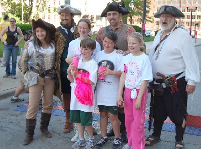 Pirates posing with pink runners