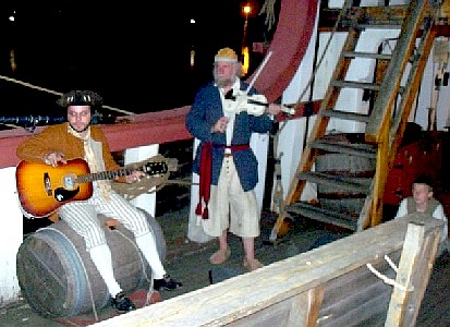 Mark and Nathan playing instruments aboard the Santa Maria 2