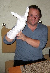 Michael makes his napkin into a rabbit