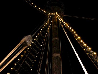 Looking up at the lighted mast