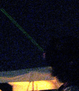 A grainy shot of the laser