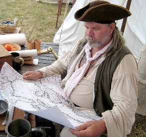Iron Jon Examining a Map