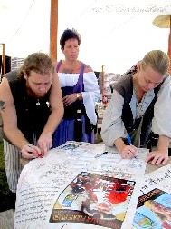 Eric, Stephanie & Wendy Sign Barbara's Poster