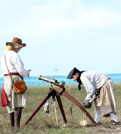 William and Dutch Load the Breech Gun