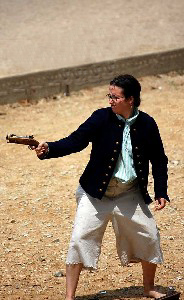 Andrea Logsdon in a dramatic pistol shot
