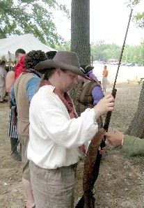 Michael Bagley checking a gun with ramrod