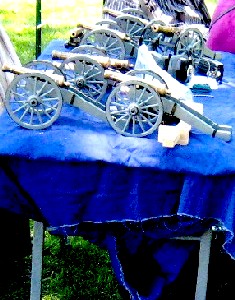 A table filled with mini-cannons