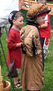 Two boys in garb side