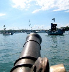 Aiming the Deck Gun at Pirate Boats