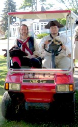 Jim and George in the golf cart