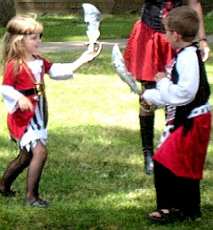 Boy and Girl Sword Fight