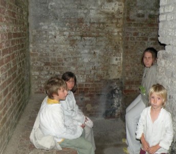 Thatcher Kids in the old fort bathroom