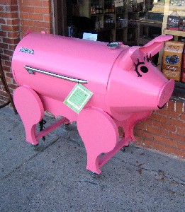 A large pink pig barbecue