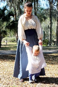 Alicia and child in garb